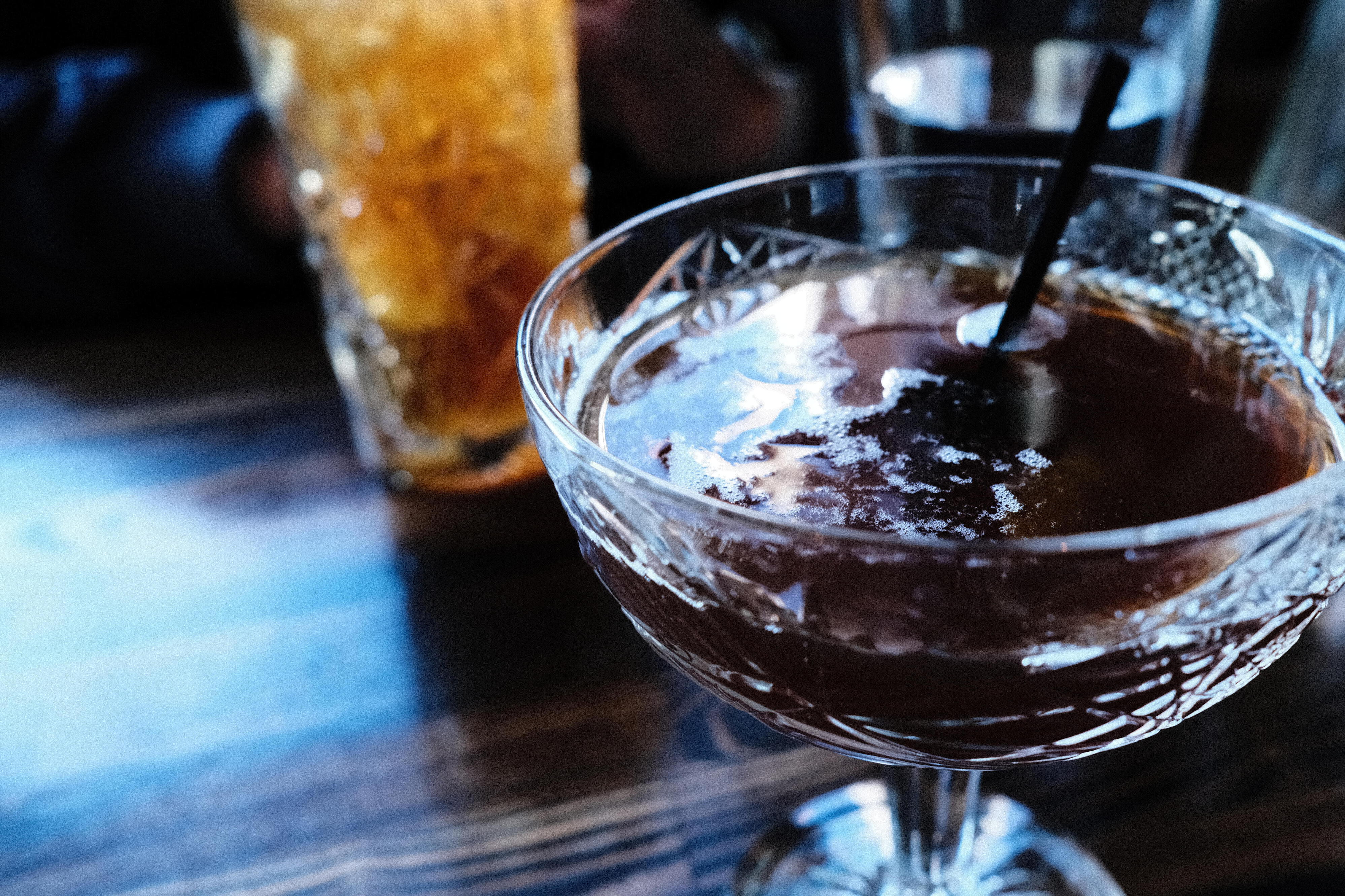 Photo of a dark-colored cocktail 