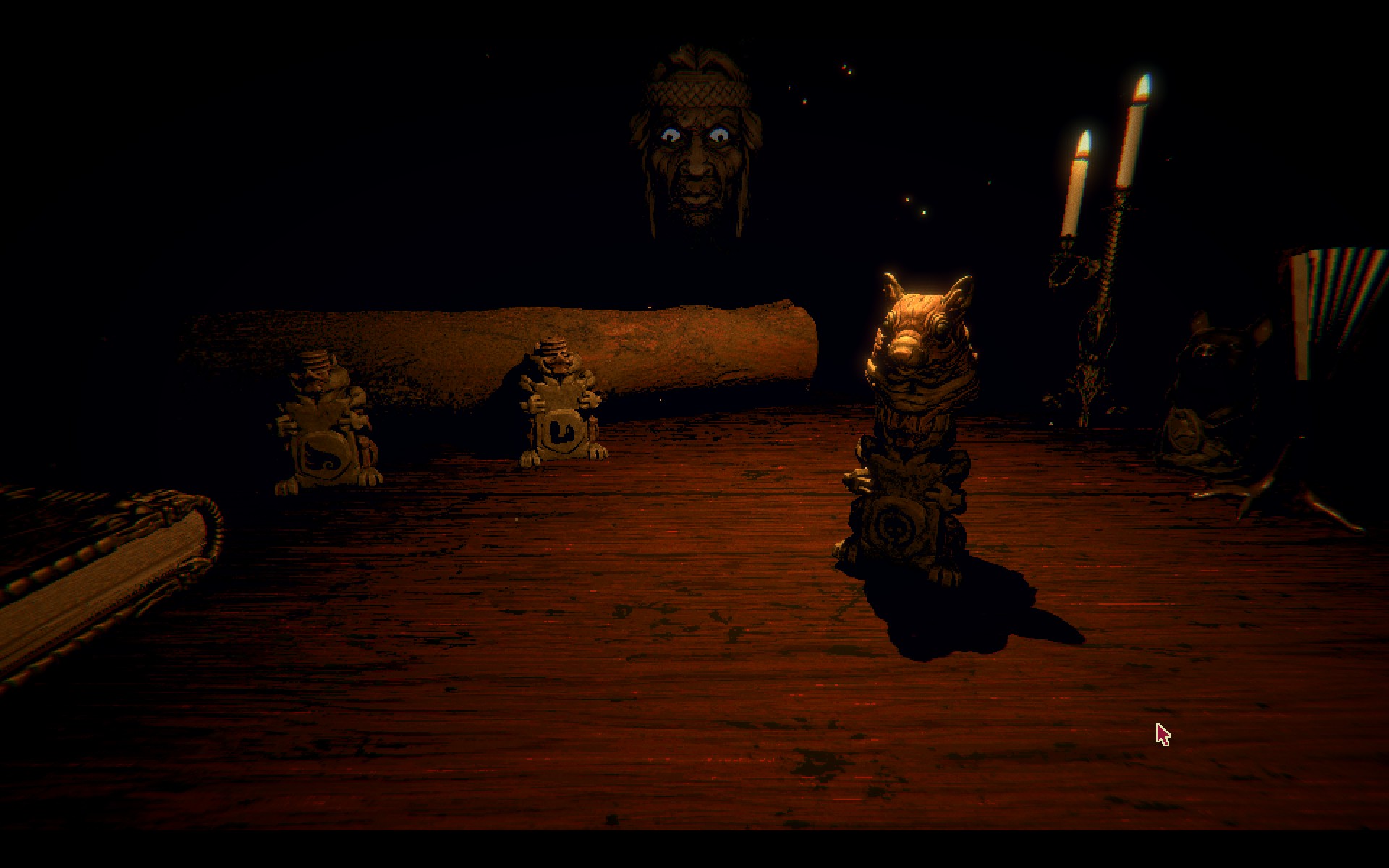 A screenshot from the game Inscryption, showing a dark wooden gaming table with a looming figure watching over. On the table sits a two-piece small statue with the head of a squirrel. 