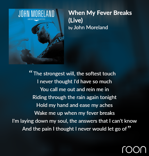 An image of the album cover for John Moreland’s album ‘Live at Third Man Records’: A close-up monotone profile image of him, bearded and in a hat and glasses, with a guitar strap across his shoulder.